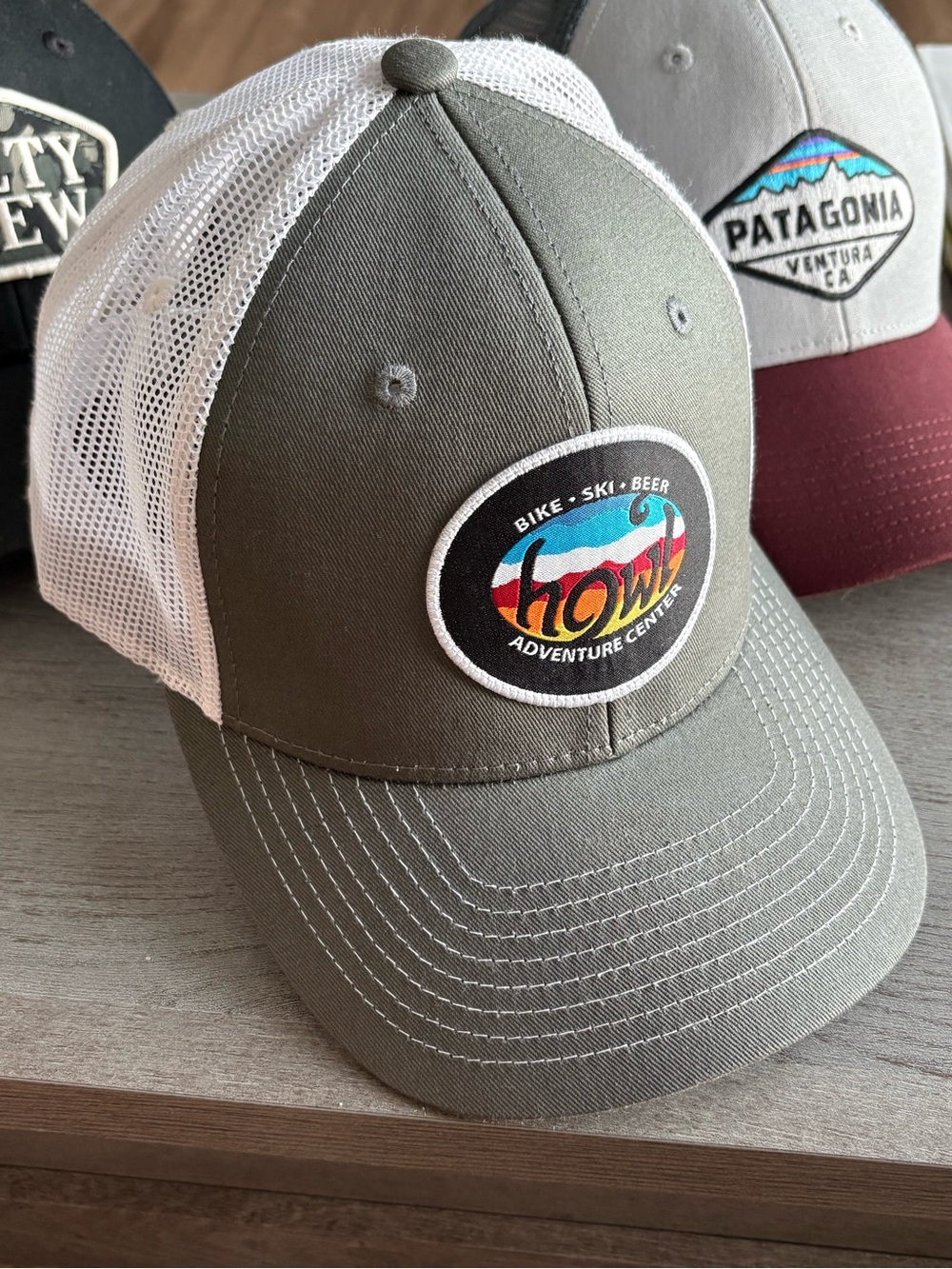 Zephyr Gray and White Trucker Hat with Colorful Howl Patch